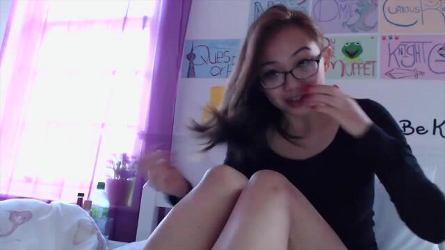 Asian teen with glasses fucks a big cock